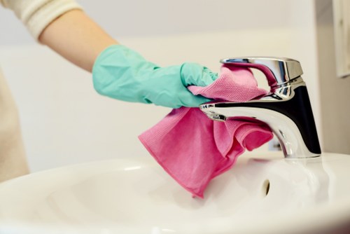 Professional upholstery cleaning on a fabric armchair